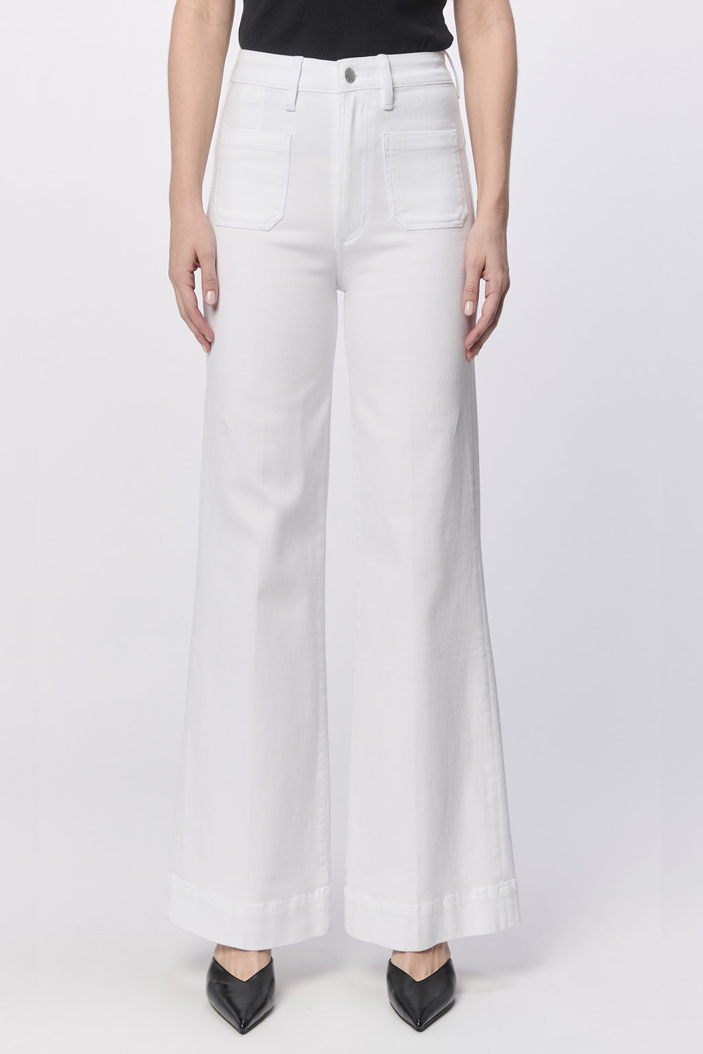 Get ready to rock that retro look with the Dear John Fiona jeans! With a high rise and full clean design, these jeans hug your curves in all the right places. And don't forget about the wide hem - perfect for showing off your favorite pair of boots!
