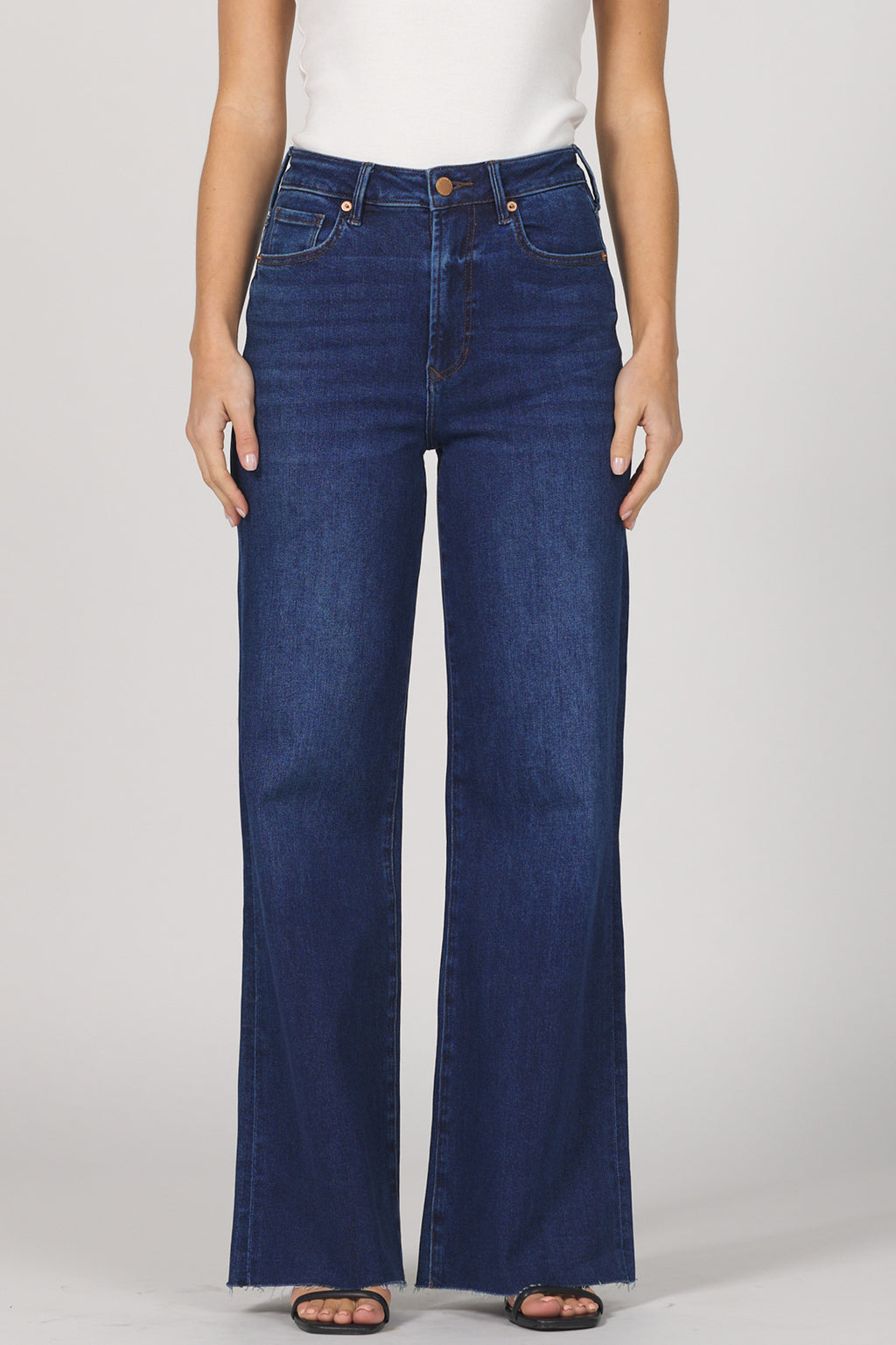 Step into effortless style with the Dear John Fiona jeans. Featuring a high-rise fit that flatters your waist and a playful cut-off hem for a touch of edge, these jeans are perfect for mixing comfort with cool. Whether you're dressing up or keeping it casual, Fiona adds a fun twist to your everyday look.