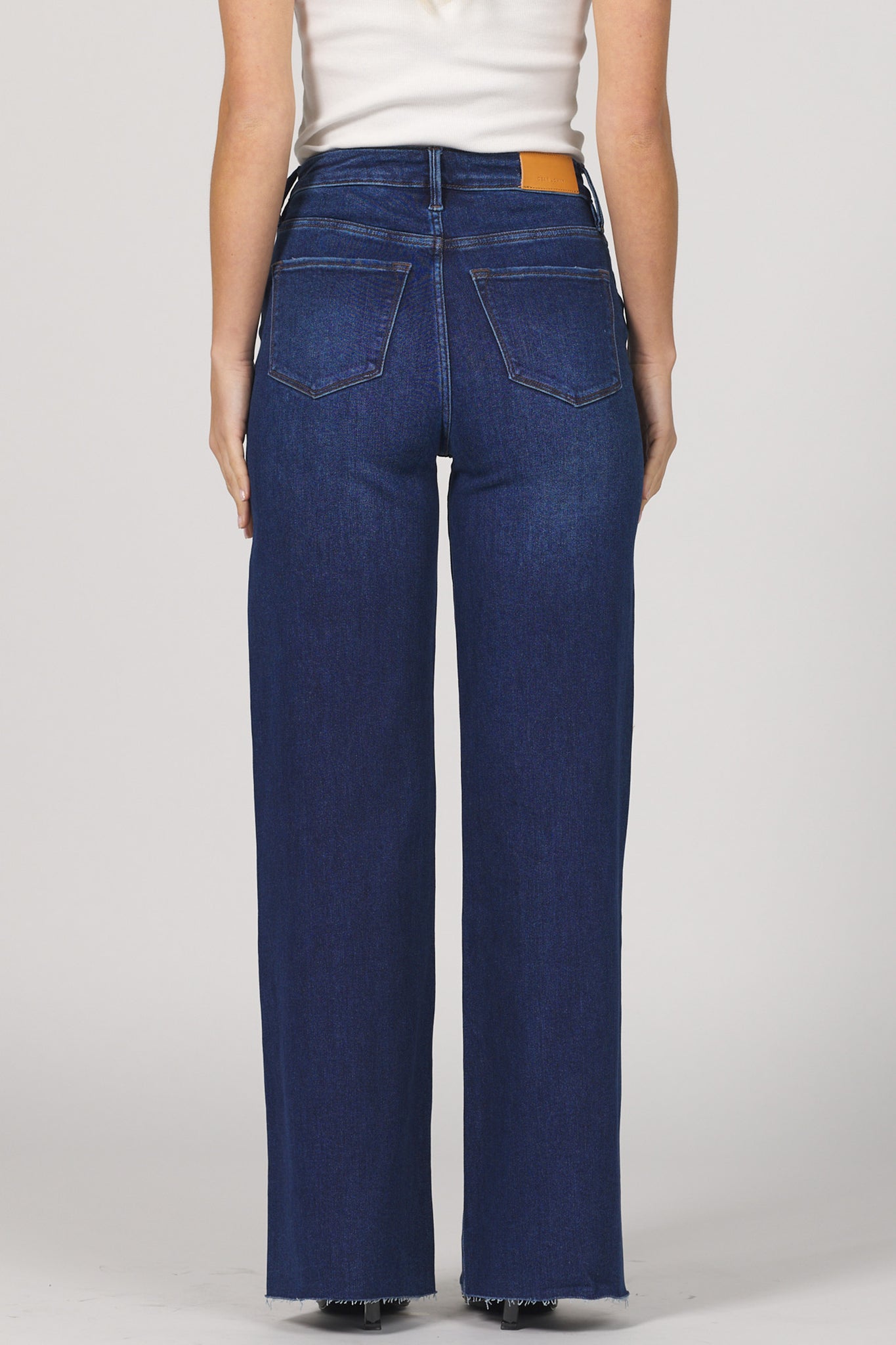 Step into effortless style with the Dear John Fiona jeans. Featuring a high-rise fit that flatters your waist and a playful cut-off hem for a touch of edge, these jeans are perfect for mixing comfort with cool. Whether you're dressing up or keeping it casual, Fiona adds a fun twist to your everyday look.