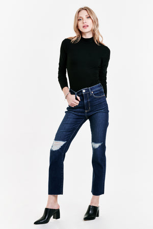 Step out in style with Dear John | Frankie! This stylish pair of straight deconstructed jeans features a frayed hem, perfect for an edgy and casual look. Add a trendy twist to your style with these must-have jeans!