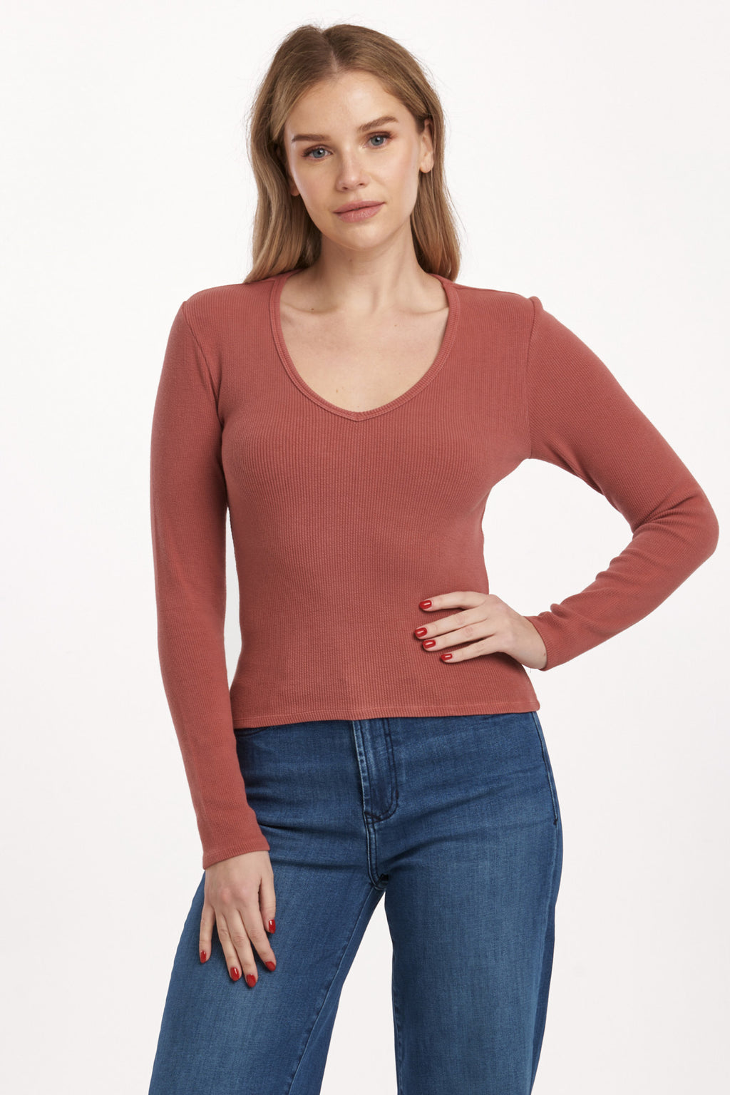 Get ready to rock the v-neck long fitted sleeve top from Dear John's Marlowe collection. This top is perfect for a night out or a casual day in. Embrace your curves with the fitted silhouette and show off your playful side with the v-neckline. (Warning: may cause compliments.)