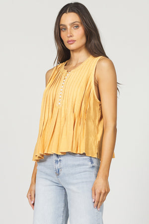 Slip into the Dear John Myron for effortless style on casual days. This sleeveless button-up features a relaxed fit that keeps you cool while looking put-together