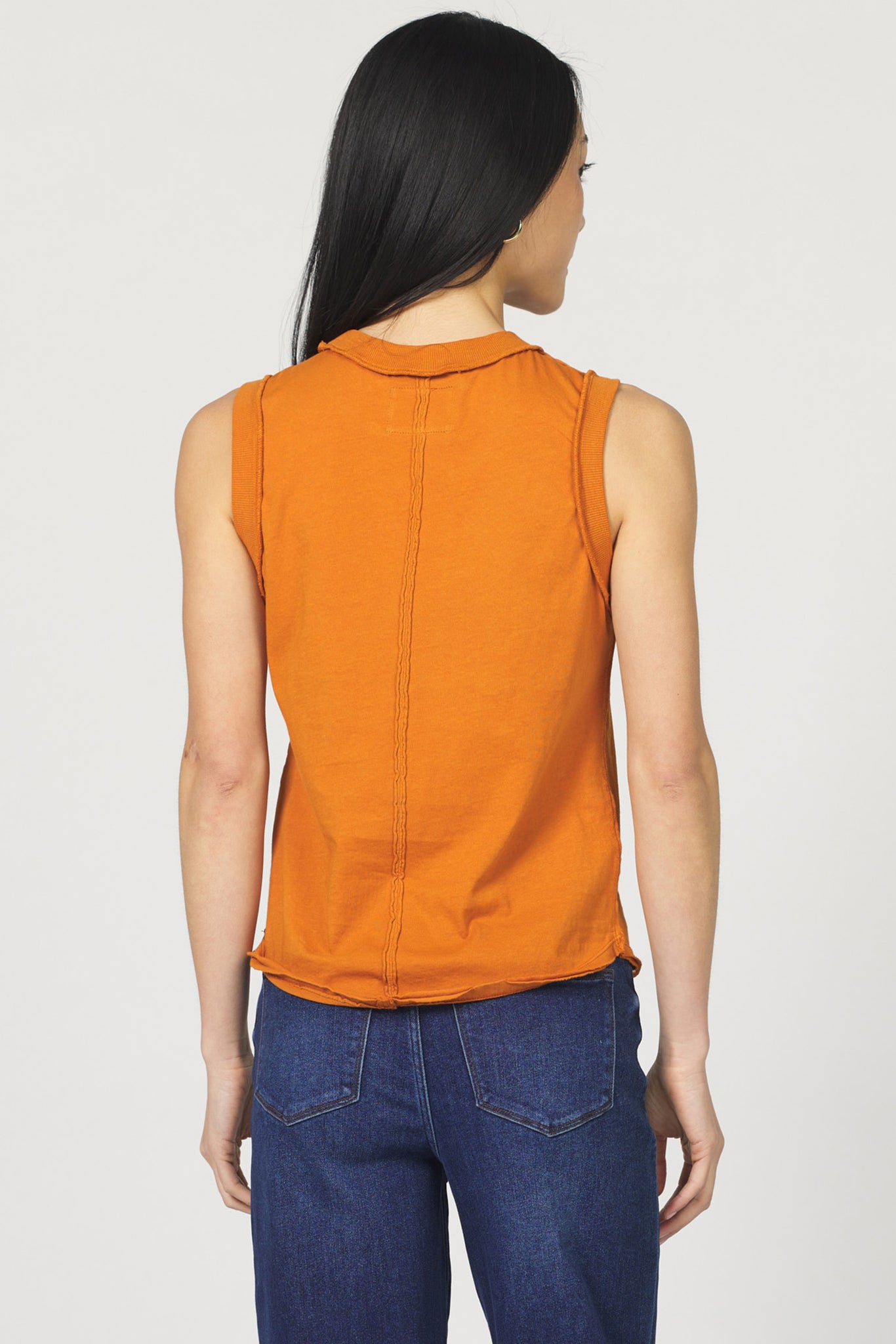 This playful round neck jersey top features a clean center back seam for a subtle twist on a classic look. Soft and comfortable, it’s perfect for adding a fun, casual vibe to your everyday wardrobe. Easy to style and effortlessly cool!