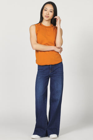 This playful round neck jersey top features a clean center back seam for a subtle twist on a classic look. Soft and comfortable, it’s perfect for adding a fun, casual vibe to your everyday wardrobe. Easy to style and effortlessly cool!