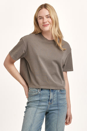 Get ready to feel comfortable and stylish in the Dear John | Maddox crew neck top. With its boyfriend fit and short sleeves, this top is perfect for any casual occasion. Say hello to your new favorite t-shirt!