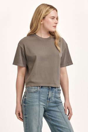 Get ready to feel comfortable and stylish in the Dear John | Maddox crew neck top. With its boyfriend fit and short sleeves, this top is perfect for any casual occasion. Say hello to your new favorite t-shirt!