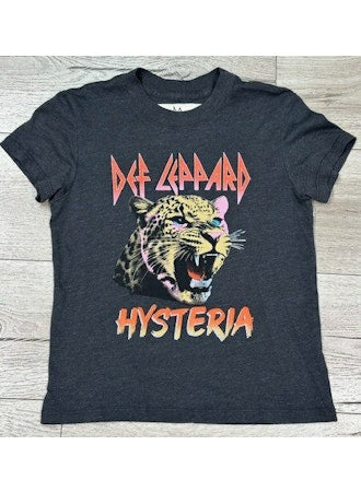 Black t-shirt with Def Leppard 'Hysteria' graphic on a wooden surface
