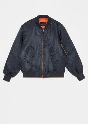 Blast off in style with this oversized bomber jacket made of luxurious satin! Its long sleeves and ribbed cuffs on the neck, waist, and sleeves offer a comfortable fit, and the front pockets with flap and snap button (plus a handy zipper pocket on the sleeve) are perfect for storing all your essentials. Featuring a contrasting lining and a front zip closure, this jacket is out of this world!