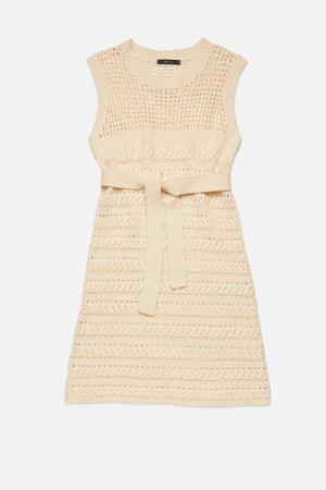 Upgrade your wardrobe with the playful and versatile RUI Knit Dress from Deluc. Made with a soft cotton blend, this sleeveless midi dress features a round collar and a unique open work knit design. The detachable belt adds a touch of customization to this quirky and fun dress.