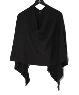 This poncho has a secret ingredient. Made with milk (yes, milk!) fiber, the result is unbelievably soft to the touch, cozy enough for those chilly evenings, and lightweight enough to wear every day. The asymmetrical hem and fringe trim provide the finish touch for a piece that's sure to become your fall staple.