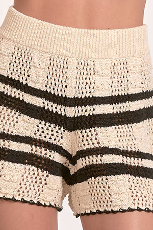 Slip into the Elan Sasha knit short for instant comfort with a side of sass! These playful bottoms are perfect for lounging, brunching, or showing off those legs while keeping things casual-cool. Soft fabric hugs in all the right places without cramping your style or your dance moves!