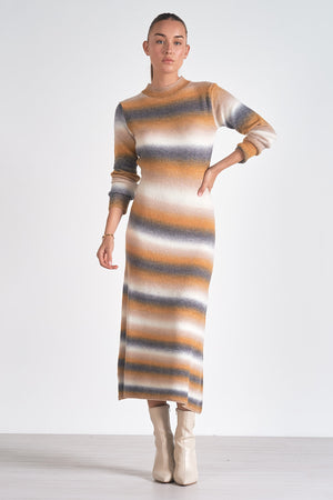 Turn up the sass factor with the Elan Baske sweater dress. This dress combines cozy comfort with stylish flair, making it the perfect choice for any occasion. With its playful design and soft fabric, you'll be turning heads and feeling fabulous all day long.