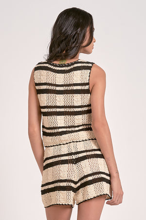 Wrap yourself in cozy chic with our Francesca knit tie front vest! This playful layering piece adds instant style to any outfit. Tie it snug or loose for different looks – perfect for brunch dates or casual office days. The versatile design transitions effortlessly from season to season, making outfit planning a breeze!
