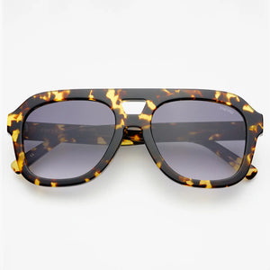 Explore the world in style with Freyrs Voyager sunglasses. These oversized aviators are made from high-quality acetate, ensuring both durability and a sleek look. Whether you're jet-setting or just running errands, these sunglasses will protect your eyes and make a statement (without taking yourself too seriously).