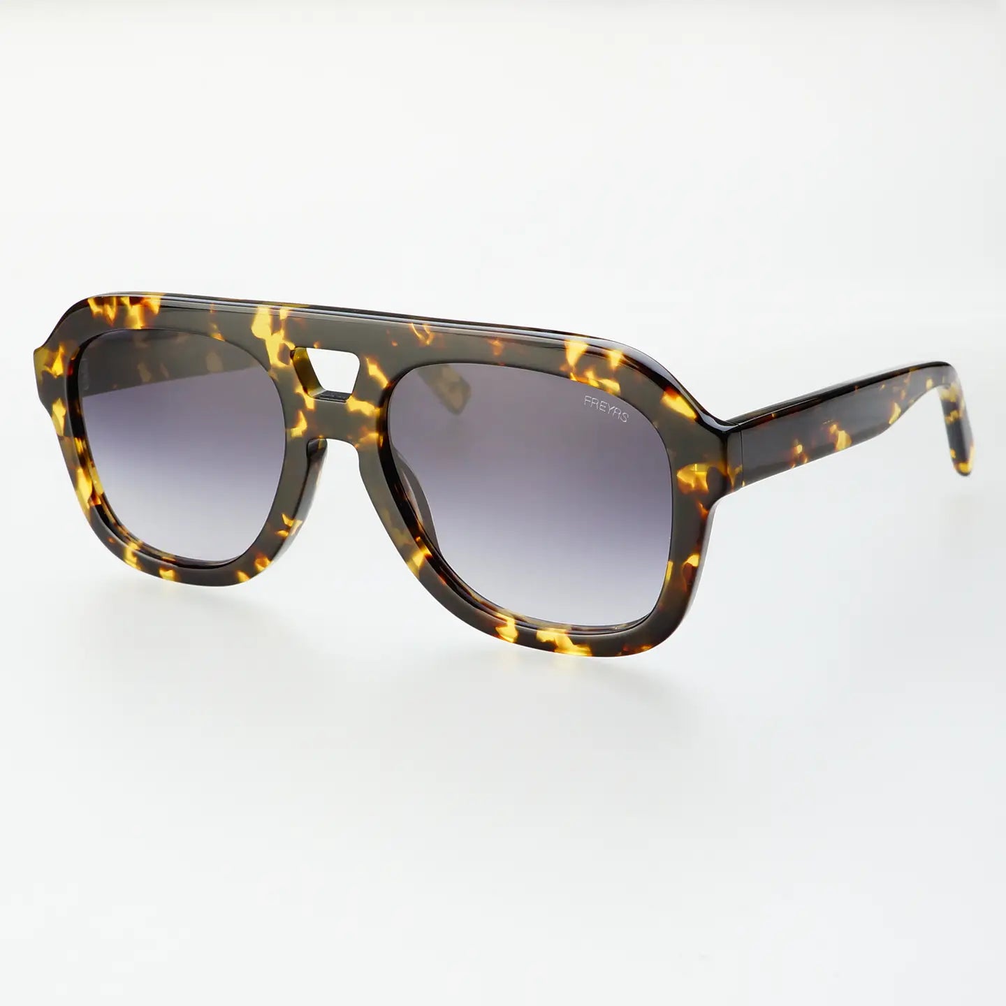 Explore the world in style with Freyrs Voyager sunglasses. These oversized aviators are made from high-quality acetate, ensuring both durability and a sleek look. Whether you're jet-setting or just running errands, these sunglasses will protect your eyes and make a statement (without taking yourself too seriously).