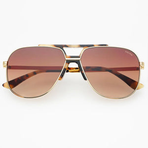Aviator sunglasses with gold frame and brown lenses on a white background