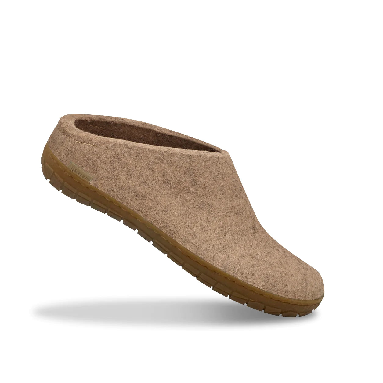 Felt slipper of 100% pure natural wool with a sole of natural rubber.