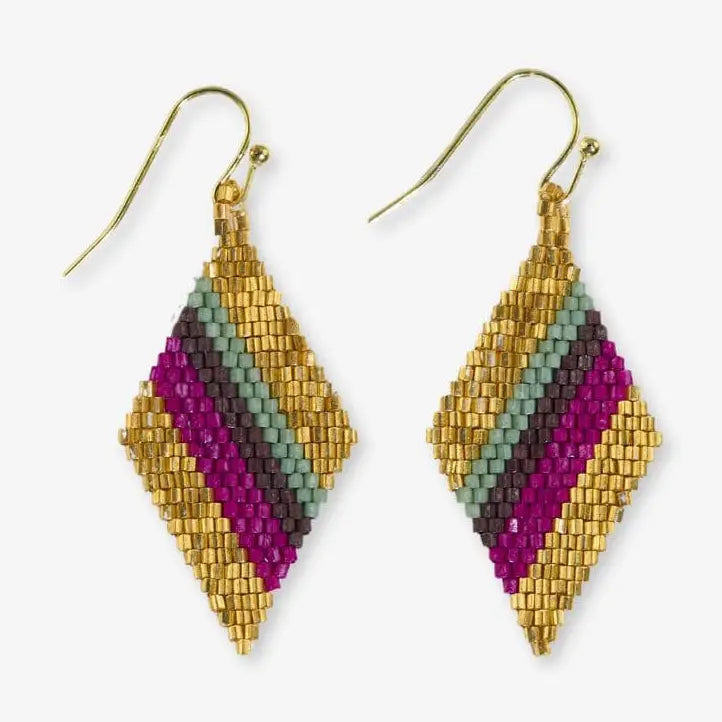 Pair of beaded earrings with gold, purple, and green pattern on a white background