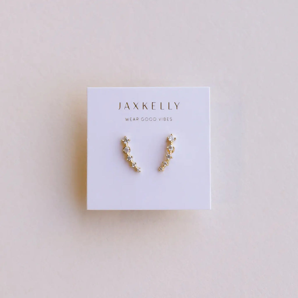 These crawlers feature five petite stones set in a slight curve.