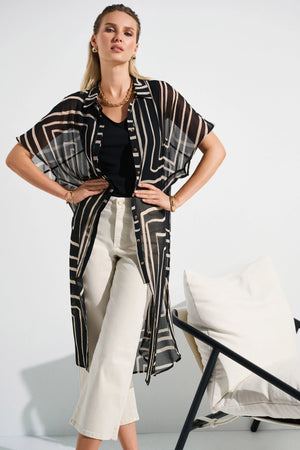 Lightweight chiffon, relaxed short dolman sleeves, and a mesmerizing geometric print come together to create a refreshing, easy-to-wear blouse. A shirt collar gives the piece soft tailoring, while a straight silhouette offers comfort and versatility.