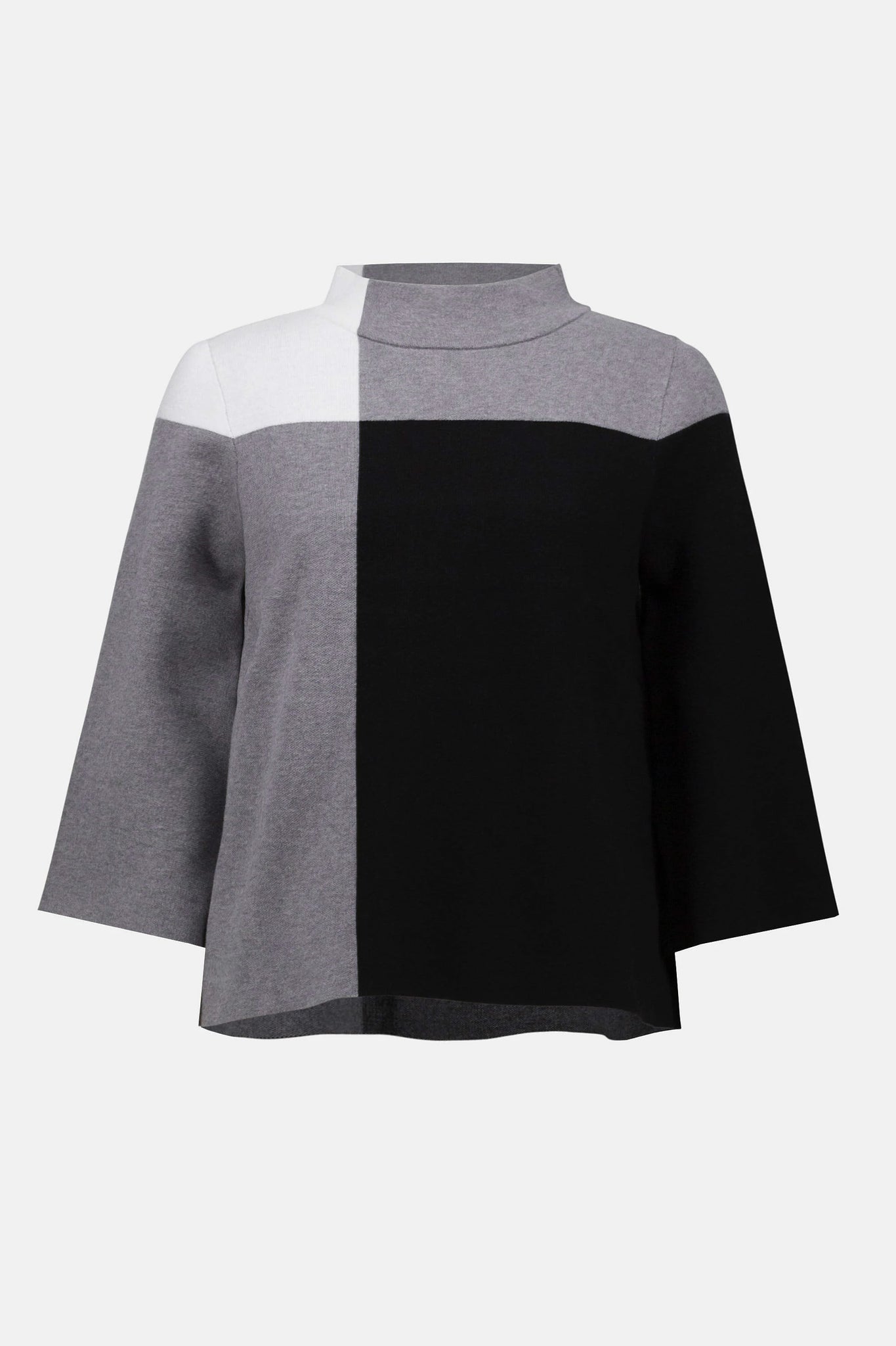 Color-blocked poncho with gray, white, and black sections on a light gray background
