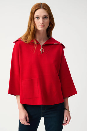 This jacquard sweater exudes a contemporary feel with its boxy silhouette, 3/4 bell sleeves, and zipped collar. The rib knit detailing at the collar and front patch pocket gives it that extra special touch making it an exquisite choice for casual outings.