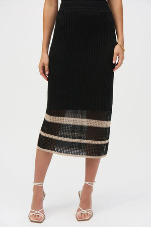 Cut from a delectable sweater knit featuring open stitch detailing and placement stripes, this sophisticated skirt makes a smart addition to your wardrobe. Finished with a comfortable elastic waistband, sultry side slits, and lightweight knit lining, this piece can be worn with its matching coverup for a coordinated look.
