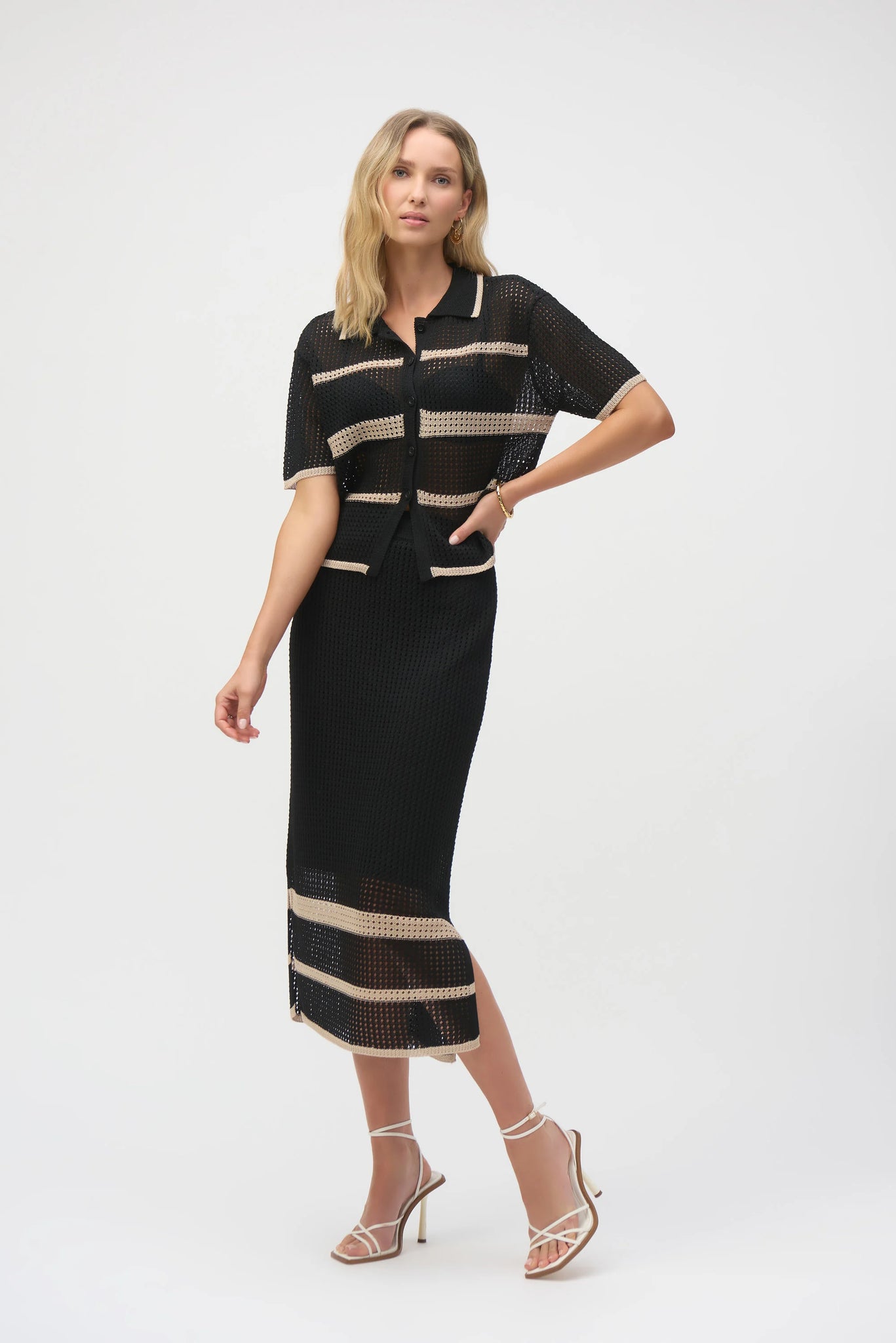 Cut from a delectable sweater knit featuring open stitch detailing and placement stripes, this sophisticated skirt makes a smart addition to your wardrobe. Finished with a comfortable elastic waistband, sultry side slits, and lightweight knit lining, this piece can be worn with its matching coverup for a coordinated look.