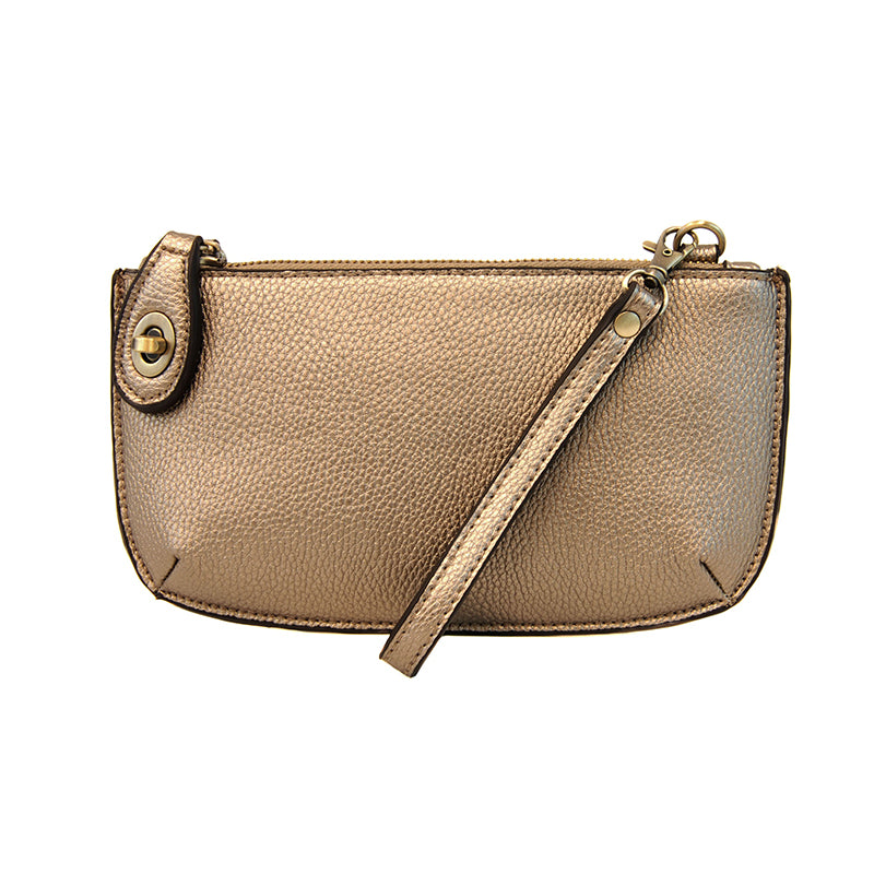 Gold leather handbag with a strap on a white background