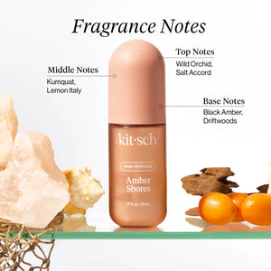 Kitsch Amber Shores hair perfume bottle with fragrance notes labels and natural elements on a white background
