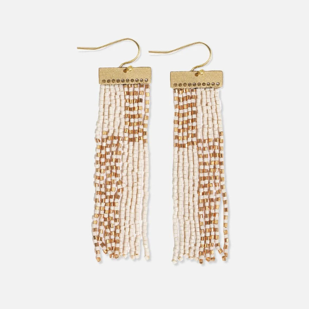 Embrace a playful color-blocked style with the Luxe Brass Lana. These brass earrings feature a combination of ivory and gold tones, topped with a brass bar for added visual interest. The color-blocked fringe design is filled with funky mini-stripes, adding a touch of uniqueness and flair. With a length of 2.85" and a width of .72", these hanger earrings make a stylish and statement-making accessory.