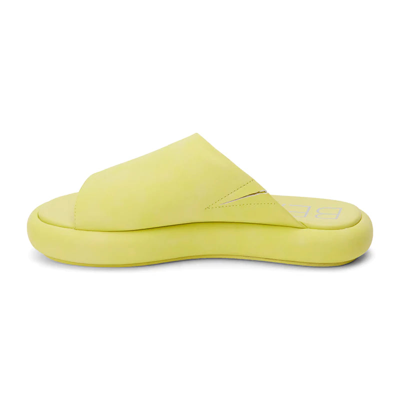 Vegan, slide sandal with an asymmetrical top band.