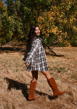 Meet LUE, the knee-high boot of your dreams from MIA Limited Edition. LUE features a tall slouched 16-inch shaft with a curvy topline, side pull loops and MIA's signature contoured footbed, making it perfect for all day wear. Crafted from genuine suede leather, 1.7-inch heel and a square toe.