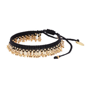 Layer with fun! This thin fringy bracelet is perfect for friendship and playful vibes