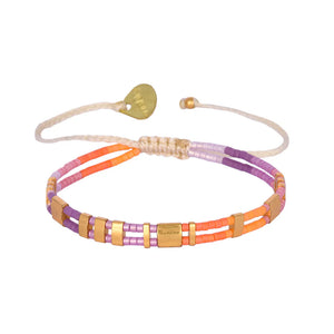 Add a touch of boho-chic to any outfit with Mishky's Scala bracelet. Featuring vibrant beads on an adjustable band, this bracelet is not only stylish but also comfortable to wear. Don't miss out on this unique accessory! (Beads-cause the envy of all your friends!)