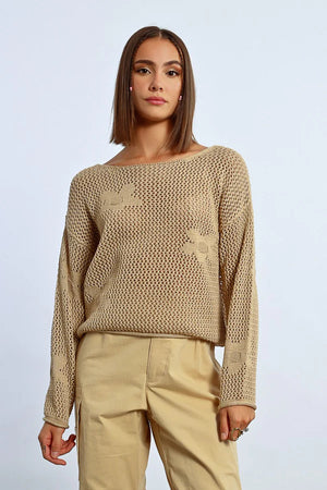 Embrace your inner flower child with the Molly Bracken Flower Power sweater. Featuring a beautiful flower crochet stitch design, this sweater adds a touch of bohemian charm to any outfit. Stay warm and stylish with this quirky and playful piece. (Peace, love, and coziness included!)