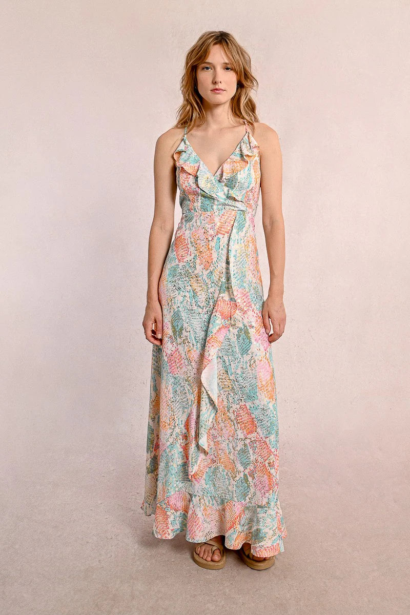 Step into the spotlight with our Jazz dress by Molly Bracken! This flirty number features delicate thin straps and a flatteringly crossed V neckline adorned with playful ruffled bands.