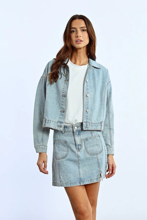 Sparkle in style with this playful denim jacket adorned with eye-catching rhinestones!