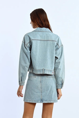 Sparkle in style with this playful denim jacket adorned with eye-catching rhinestones!