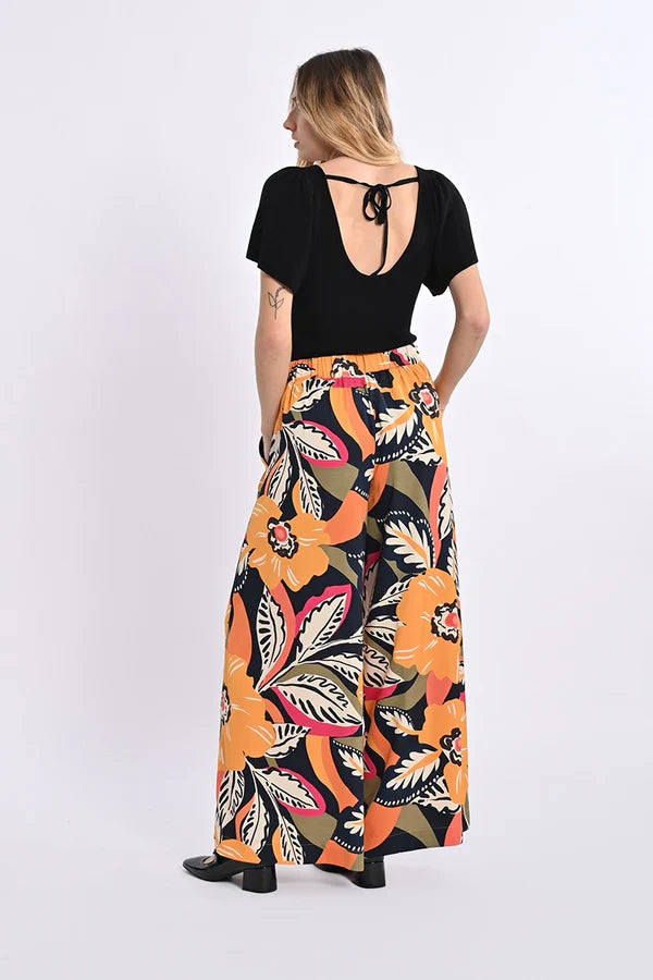 Ditch the basic jeans and elevate your look with the Molly Bracken | Nassau pants. These wide, printed pants not only offer a statement look, but also provide comfort with a high, elasticated waist. Plus, the side pockets add functionality without compromising style. Make a bold fashion statement today!