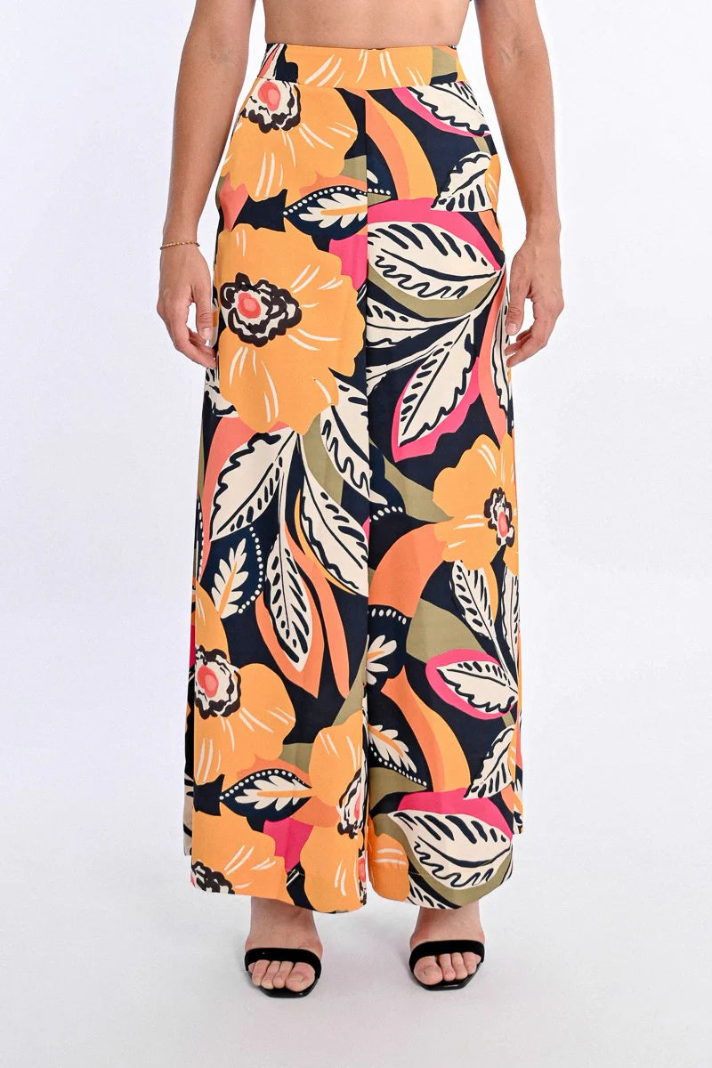 Ditch the basic jeans and elevate your look with the Molly Bracken | Nassau pants. These wide, printed pants not only offer a statement look, but also provide comfort with a high, elasticated waist. Plus, the side pockets add functionality without compromising style. Make a bold fashion statement today!