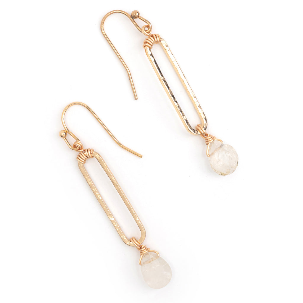 Add a touch of shine with the Nakamol Alisa gold rectangle drop earrings adorned with clear stones. These unique earrings will elevate any outfit and make a statement. Let your ears do the talking with these playful and stylish accessories!
