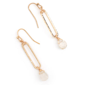Add a touch of shine with the Nakamol Alisa gold rectangle drop earrings adorned with clear stones. These unique earrings will elevate any outfit and make a statement. Let your ears do the talking with these playful and stylish accessories!