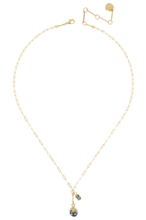 Gold necklace with a pendant on a white background