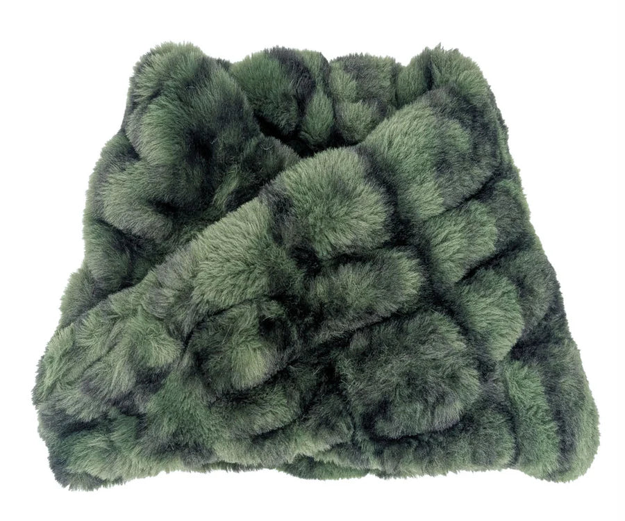 Green textured blanket on a white background