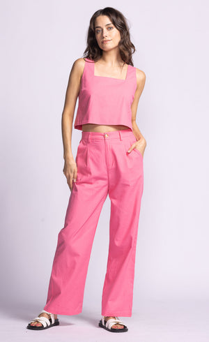 Introducing the Delaney Pant, a playful and stylish addition to any wardrobe! These pink trousers will add a pop of color and personality to any outfit. Perfect for those who like to have fun with their fashion.