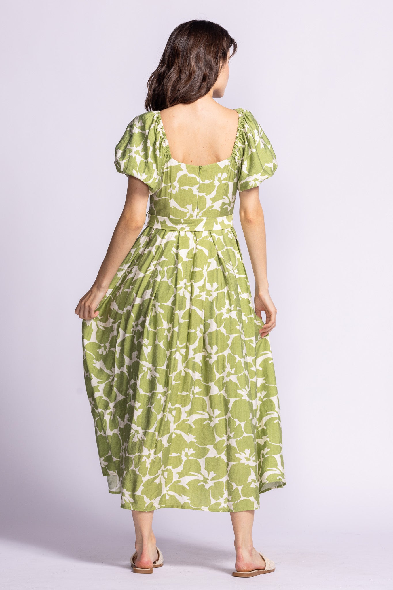 Unleash your playful side in the Pink Martini | Rachel floral maxi dress. This flowy number is perfect for any occasion, bringing both fun and elegance to your wardrobe. With its gorgeous floral design, you'll turn heads and feel confident all day long. Time to bloom!