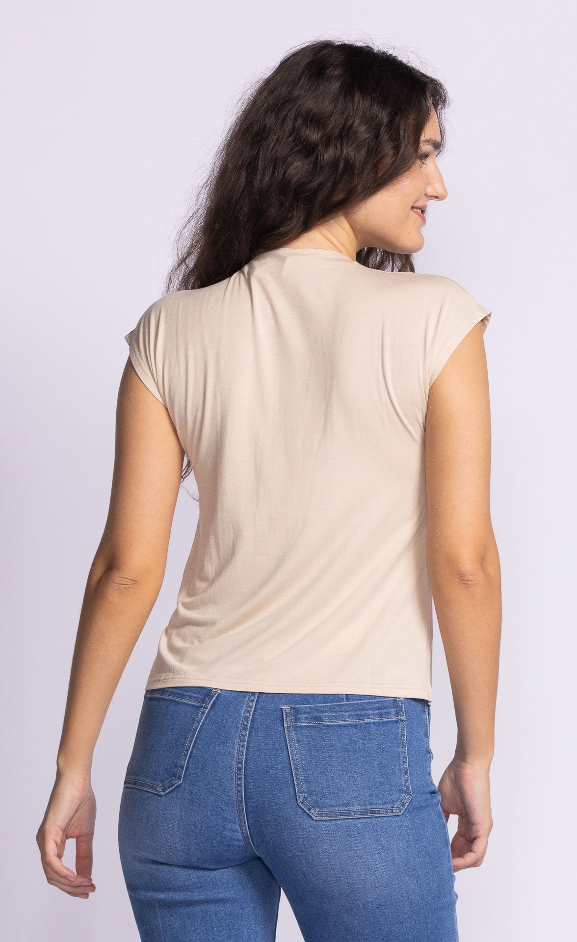 Unleash your playful side with Pink Martini's Shannon high neck tee. Don't let the basic style fool you, this tee comes with endless possibilities for mixing and matching, making it a versatile addition to your wardrobe. Get ready to turn heads with this quirky and fun essential.