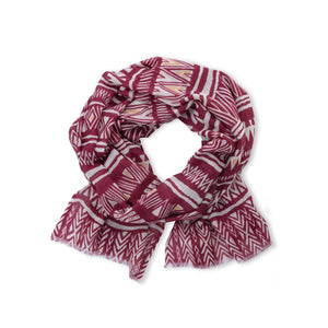 Add some eccentric flair to your outfit with Pistil's Eliot Scarf! This printed scarf will make a bold statement while keeping you cozy and stylish. Perfect for adding a touch of personality to any look.