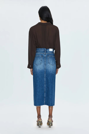 Of-the-moment, yet eternally stylish - our best selling skirt features an elongated midi length and five pocket denim design notes. Crafted from rigid denim without stretch for sophisticated fit and fall, with a well considered front skirt slit for ease of movement. Fairfax is a medium blue denim wash with moderate fading and wiskering, finished with a scissor cut hem.